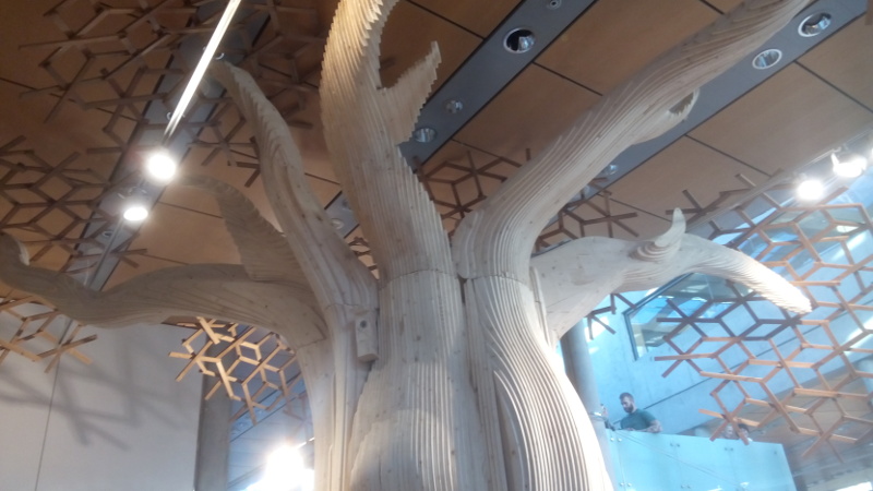 Wild Wild Wood Exhibition, Nordic Embassies Berlin. A wooden tree and its tree top.